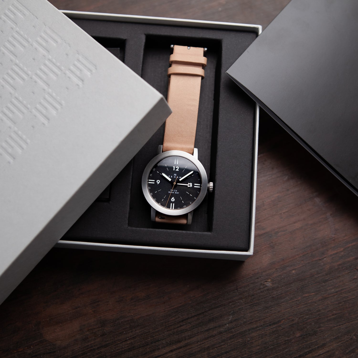 Open product box with a watch inside